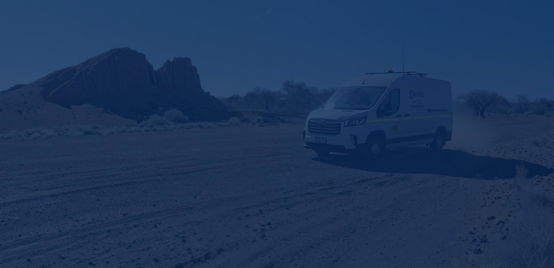 A1 Vending Kalgoorlie service van driving on an outback road in Western Australia